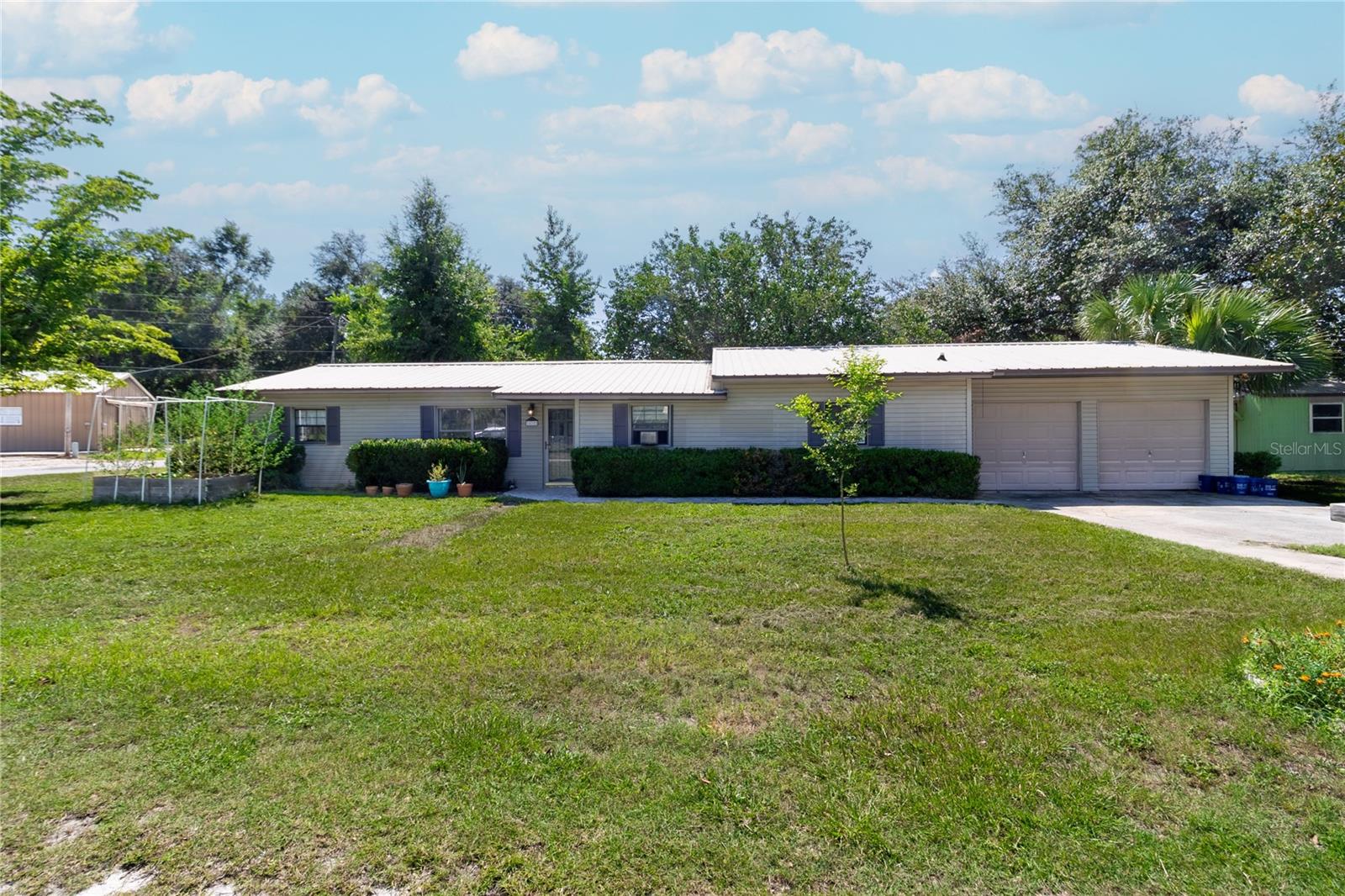 Welcome to 525 Padgett Ave SE in Live Oak, FL! This beautifully updated 3-bedroom, 2-bath home offers 1,846 sq ft of comfortable living space on a spacious corner lot. Enjoy peace of mind with a durable metal roof and brand-new flooring throughout. The renovated bathroom adds a fresh, modern touch, and the private hot tub is perfect for unwinding. You'll also love the extra storage options both inside and out. This move-in ready home blends charm, functionality, and value—don’t miss your opportunity to make it yours!