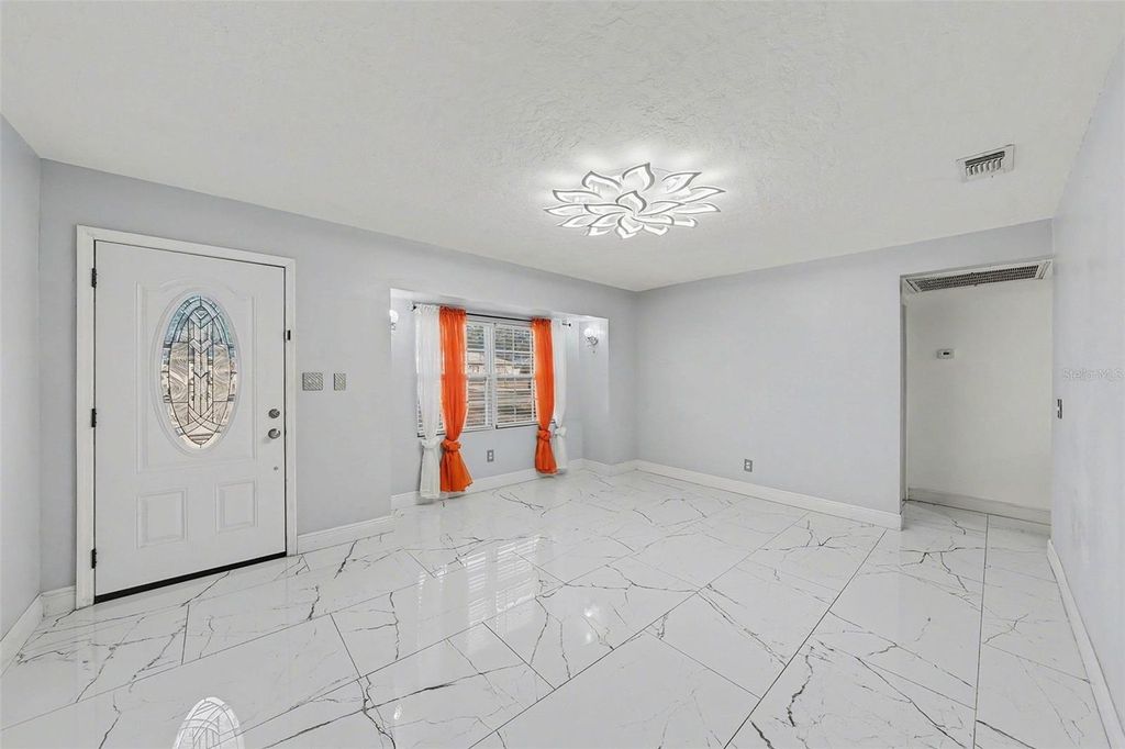 Photo of 2910 W Burke Street, Tampa, FL 33614 (MLS # TB8467672)