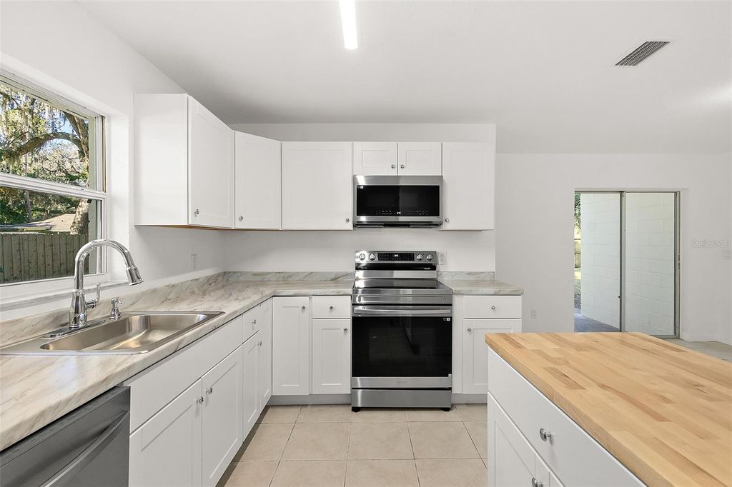 Photo of 145 Oak Ridge Avenue, Edgewater, FL 32132 (MLS # V4946285)