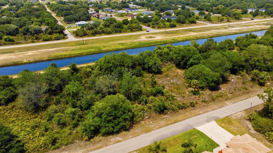 Discover the perfect opportunity to build in the rapidly growing community of Lehigh Acres! This 0.28-acre homesite offers a prime location with canal frontage in your back yard, providing added privacy and a natural buffer. Ideally situated close to a golf course and surrounded by shopping/dining options, this property blends convenience with a peaceful setting. Located in an area experiencing a surge of new construction, this lot is perfect for investors, builders, or anyone looking to secure land in a high-growth market. Enjoy easy access to South West Florida's beautiful beaches and major airports, making travel and coastal living just a short drive away. Don't miss your chance on this beautiful lot in a fantastic area call today!