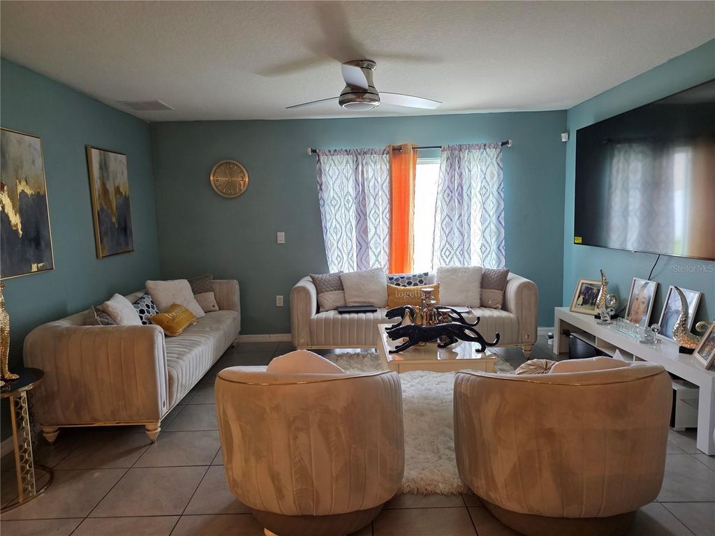 Photo of 566 Sunlit Coral Street, Ruskin, FL 33570 (MLS # O6341996)