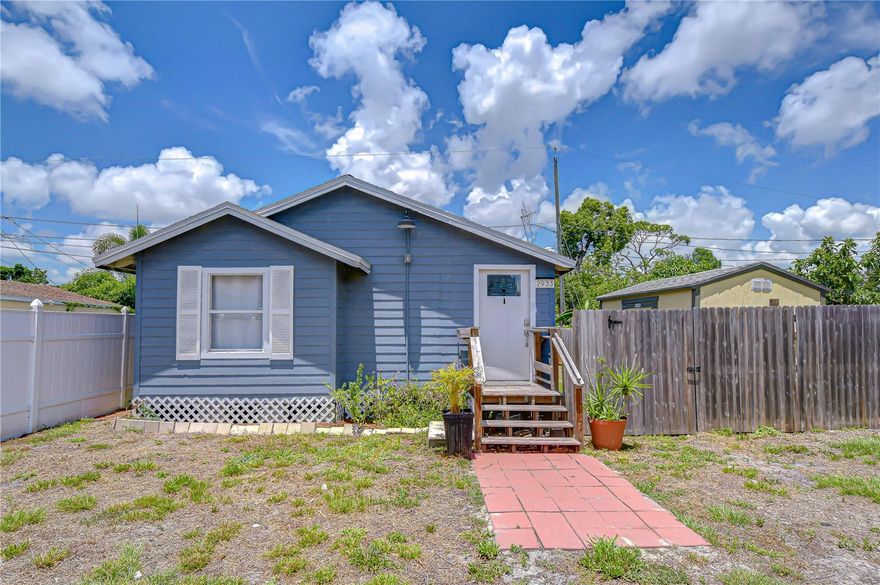 Charming 2-bedroom, 2-bath bungalow in a desirable Pinellas County location offering the perfect blend of historic cottage charm and modern updates. This inviting home features an open floor plan with laminate flooring throughout, creating a warm and spacious living environment. The primary suite includes an en-suite bath with tub/shower combination, single vanity, and walk-in closet. A generously sized second bedroom offers flexibility for guests, a home office, or both. The updated kitchen is equipped with stainless steel appliances, stone countertops, and ample cabinetry for everyday living and entertaining. Just off the kitchen, the second bathroom features a walk-in shower and convenient indoor laundry area. Step outside to a fully fenced backyard with a paved patio ideal for grilling and outdoor gatherings, plus a storage shed for added convenience. The oversized front yard provides additional space for recreation or parking. Located in Flood Zone X, flood insurance is not required. Conveniently situated near shopping, restaurants, medical facilities, and more, with easy access to downtown St. Petersburg, downtown Tampa, Tampa International Airport, and the beautiful Gulf Coast beaches. Filled with character and thoughtful updates, this delightful home is truly move-in ready and a must-see.
