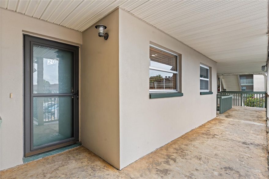 ***  FLOOD INSURANCE IS INCLUDED IN HOA FEE *** WITH AN OFFER AT FULL ASKING PRICE, SELLER WILL PAY 6 MONTHS OF HOA FEES VALUED AT $4,300! Welcome to this charming second-floor condo located in the highly sought-after Anchor Point community, nestled on a deep-water canal just minutes from Tampa Bay, the Gulf of Mexico, and local rivers. This well-maintained 2-bedroom, 2-bathroom unit offers the perfect blend of comfort, style, and coastal living. Step inside to an inviting open floor plan featuring a spacious kitchen with tile flooring, granite countertops, wood cabinetry, stainless steel LG refrigerator, and plenty of cabinet and counter space—ideal for cooking and entertaining. The family room boasts warm hardwood floors and ample space to relax or host guests. The primary bedroom includes a large walk-in closet and an ensuite bath with tile flooring, granite countertops, and a retiled walk-in shower (updated in 2022) with sliding glass doors. The guest bedroom is also generously sized with cozy carpet, while the guest bathroom features tile floors, a reglazed bathtub and a new vanity installed in 2022. Enjoy your morning coffee or evening breeze from the screened-in patio with tranquil pool views and partial canal views. A storm door at the front entrance adds natural light, improved security, and energy efficiency. The entire interior was repainted in 2022, giving it a fresh, move-in-ready feel. Anchor Point offers fantastic amenities including a heated community pool, waterfront grill area, recreation room, and affordable maintenance fees that cover exterior maintenance and roof replacement. Boat slips are available for rent at a very reasonable rate—perfect for boaters! Located within walking distance to Apollo Beach Nature Park, Circles and Finns waterfront restaurants, coffee shops, and more—this is your chance to enjoy Florida living at its best!