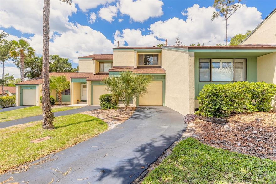 This 2-bedroom, 2.5-bath townhouse-style condominium is in the Sugar Mill Golf Community of Pine Valley.  It features a first-floor kitchen and dining/living area with sliders opening to a back patio which is ideal for outdoor relaxation.  There is also a first-floor laundry room with a half bath for everyday convenience. Upstairs, the primary en-suite includes its own private balcony the overlooks the community courtyard, and the second bedroom offers its own dedicated bathroom providing privacy for both bedrooms. The golf cart-size garage provides storage for a golf cart and the local cart paths make easy access to the community's private golf course (membership is an additional fee).  The garage can double as generous storage space, office, studio or exercise space, for anyone without a golf cart who prefers to use it another way.  Community amenities include private mailboxes, a community pool, and tennis courts and outside the community it is a 15-minute drive to the famous Canal Street, Flagler Avenue and the beach. Come see if this opportunity to own in New Smyrna Beach if right for you and start enjoying the Florida lifestyle soon.  This property is eligible under the Freddie Mac First Look Initiative through 6/6/26.  Owner Occupants, non-profit and Neighborhood Stabilization Program offers will be considered FIRST LOOK.  Buyer to pay doc stamps. There are no warranties expressed or implied.  All measurements are approximate.  Sq. footage received from the tax rolls.  All information recorded in the MLS is intended to be accurate but can not be guaranteed.  Buyer should check zoning for rental restriction.