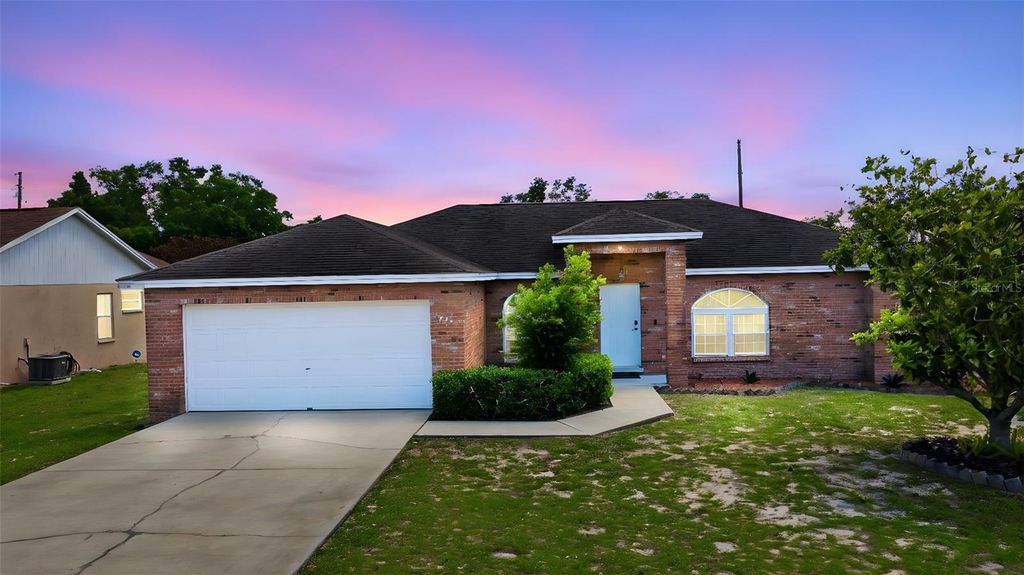 Photo of 774 Barclay Terrace, Lake Wales, FL 33853 (MLS # O6400035)