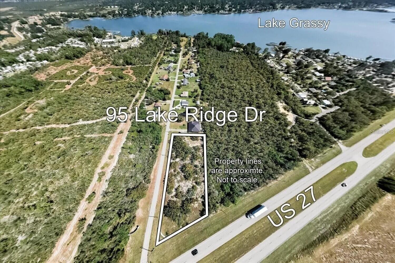 Owner Financing Available! Presenting an exceptional opportunity to build your dream home on a spacious 1.41-acre lot within the desirable Lake-Ridge subdivision. This oversized, corner lot boasts 188 feet of frontage on US 27 & 350' on Lake Ridge Dr, offering convenient access. Situated within walking distance of the picturesque Lake Grassy. The lot is bordered by a parcel in its natural state, enhancing the peaceful ambiance. With a paved roadway and ample space, this location is perfect for your new home. This lot can also be split up into 4 buildable lots. Seller will subdivide if someone only wants to buy 1-2 lots. Drive by today and envision your new home in this beautiful setting! Lake Placid, situated near the center of Florida between Sarasota and Fort Pierce, is a picturesque small town boasting 27 freshwater lakes, nearly 50 outdoor murals, and a bustling downtown of boutique shops and diverse restaurants.