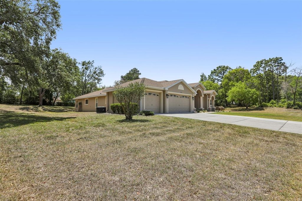 Photo of 13185 Cooper Road, Spring Hill, FL 34609 (MLS # TB8500477)