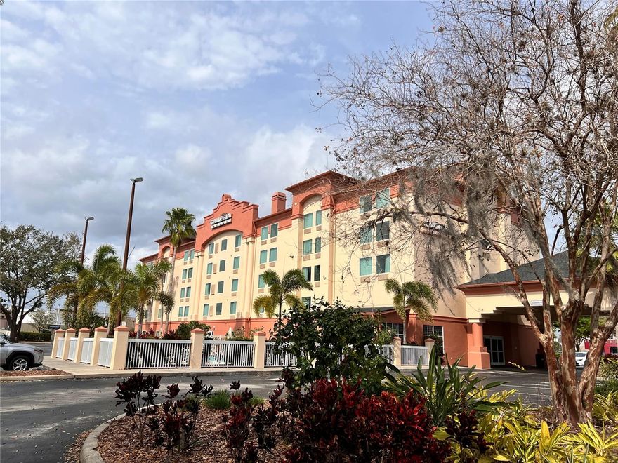 INVESTOR ALERT- Remodeled 2nd floor condo-hotel unit in the Galleria Palms located close to parks, dining and entertainment with easy access to major highways. This suite features over $17,000 in renovations with 2 queen size beds, upgraded with crown molding, new tile flooring throughout, new paint, lighting, artwork, furnishings, wall-mounted 49in flat screen TV, granite vanity with microwave, mini-fridge, coffee maker, wet bar, upgraded wi-fi, iron/ironing board and USB ports in the lighting fixtures all for your convenience. Bathroom offers dual sinks with granite counters. Complimentary shuttle service to parks and a hot breakfast served daily in lobby. Newer roof, windows and A/C units have all been recently installed making The Galleria Palms the perfect opportunity to be your 1st investment or add to your current portfolio as a turn-key suite. Take a swim in the heated pool and relax on sun deck! This condo-hotel offers investors the perfect combination of hassle free investment and a wonderful place to stay while in the Orlando area. There is a full-time property management company. *Owners cannot occupy longer than 29 days at any one stay. The unit cannot be removed from the onsite rental program