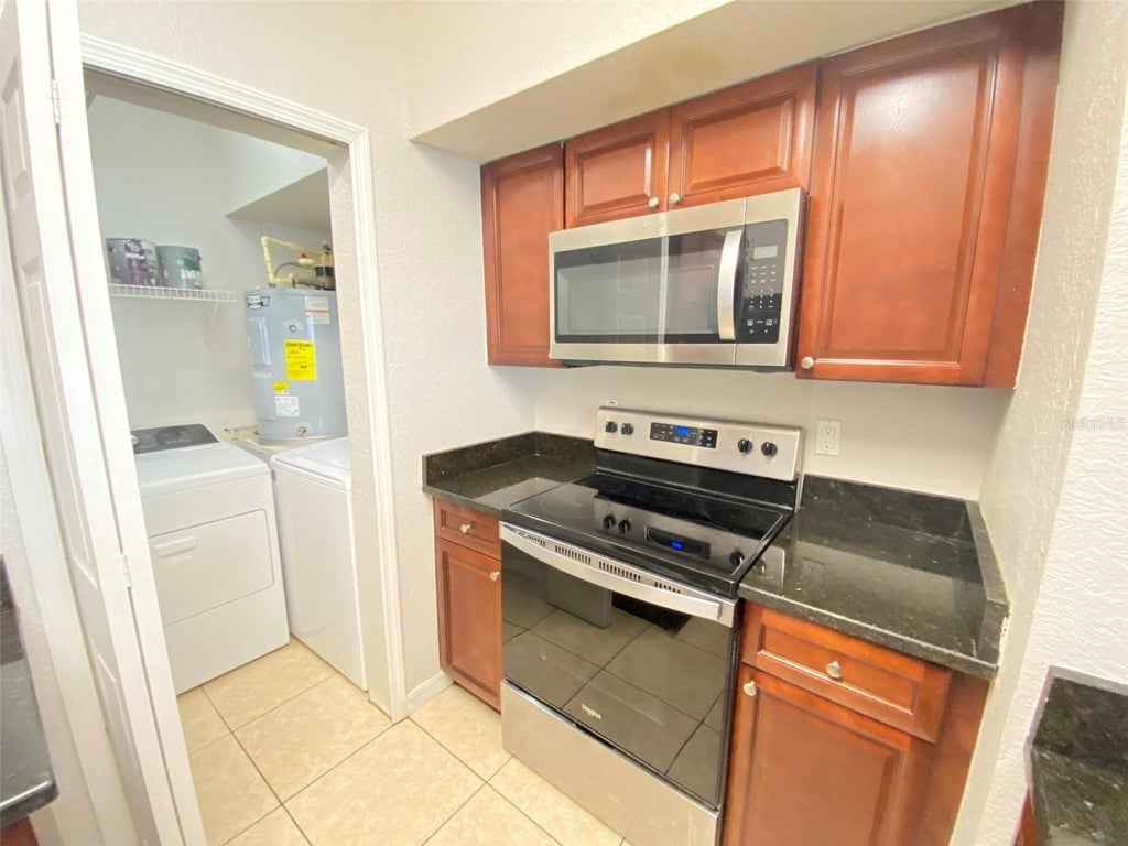 Photo of 5118 City Street #514, Orlando, FL 32839 (MLS # O6442837)