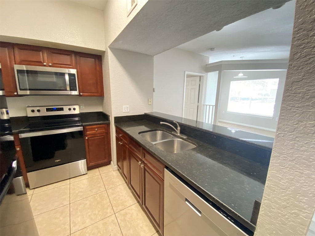 Photo of 5118 City Street #514, Orlando, FL 32839 (MLS # O6442837)