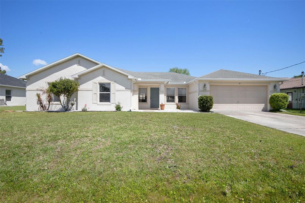 Photo of 27 Wood Arbor Lane, Palm Coast, FL 32164 (MLS # FC317562)