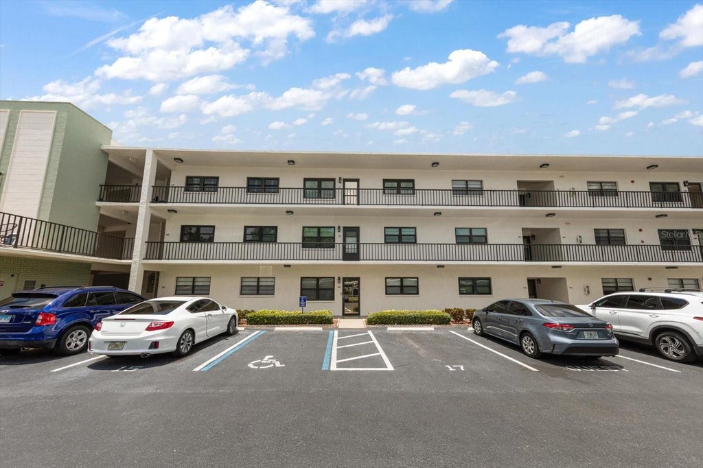 Photo of 5980 Terrace Park Drive N #310, St Petersburg, FL 33709 (MLS # TB8523445)