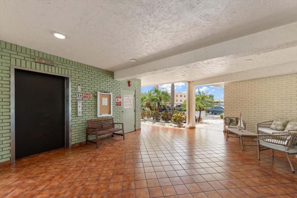 Photo of 5980 Terrace Park Drive N #310, St Petersburg, FL 33709 (MLS # TB8523445)
