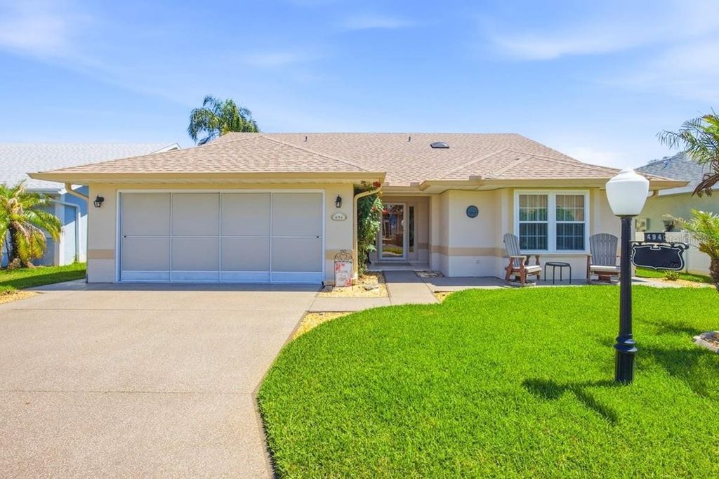 Photo of 494 Sweetwater Way, Haines City, FL 33844 (MLS # O6408650)