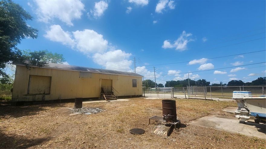 Discover the potential of this gated industrial property, perfectly situated on a corner lot in the heart of Historic Lake Wales. Located just minutes from Downtown Lake Wales and near a Major Industrial Plant, this property offers a strategic location with easy access to major routes and business hubs. Its prime location in an area undergoing exciting revitalization makes it an exceptional investment opportunity. With ongoing development efforts breathing new life into the historic district, this space is ideal for businesses looking to establish themselves in a growing and evolving market. Schedule an appointment today!