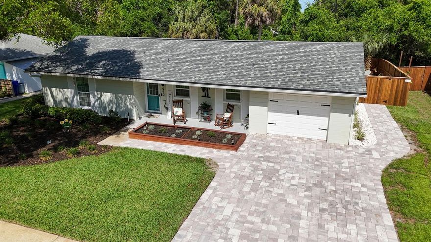 Just a quick 2 minute walk to the ICW, Indoor- Outdoor living is the standout feature of this St. Augustine Shores home. With a fully fenced backyard backing to green space, and a spectacular, oversized paver patio- installed in 2025, that includes a pavered oversized driveway, and a pavered path to the back yard- where you have plenty of room for a future pool! A screened-in porch, Florida Room, and immaculately maintained home are waiting for you! 

This 2-bedroom, 2-bathroom home is full of upgrades, flexible living space, doors and windows were replaced in 2021, complemented by tinted vinyl windows (2022) in the Florida room with updated flooring (2021), while upgraded electrical and added insulation throughout the home, including the garage ceiling and insulated garage door. 

Inside, the home features tile and luxury vinyl plank flooring (2021), the updated kitchen is paired with a full appliance package, with all appliances replaced within the last 3 years. The Florida room is fully finished with extra electric outlets, creating a versatile, light-filled space, currently being used as an office.

The garage has been transformed into a fully air conditioned flex space under heat and air, adding 500+ square feet. Ideal for a hobby room, entertaining, a study, studio, office or a workshop with limitless possibilities! Mini-split system (2022), and insulated garage door (2022). Both AC Units have transferable maintenance contracts.  Gutters added in 2022, and irrigation is already in place.

St. Augustine Shores is a large, amenity-rich, Intracoastal Waterway, and Golf Club oriented community with low HOA fees, extensive parks, amenities and trails that encapsulates the true Florida lifestyle. With your experience is anchored by The Riverview Club, where, as an HOA member have access to: A ballroom, multi-purpose rooms, and conference room, 18,000 gallon pool overlooking the ICW, Fishing Pier where you can watch the fireworks on the fourth, Horseshoe Pits, Wildflower Garden, Volleyball courts, Multiple playing fields including tennis, pickleball courts, children’s playground all with stunning ICW Views and incredible sunrises. Not to mention the 50+ miles of walking and biking paths, multiple parks, and over 100 miles of sidewalks.

The Shores Golf Club is an 18-hole, par-70 course located within the community, with membership available. About four miles south of historic downtown St. Augustine and convenient to US-1 for shopping, grocery, and services and minutes to the beach!