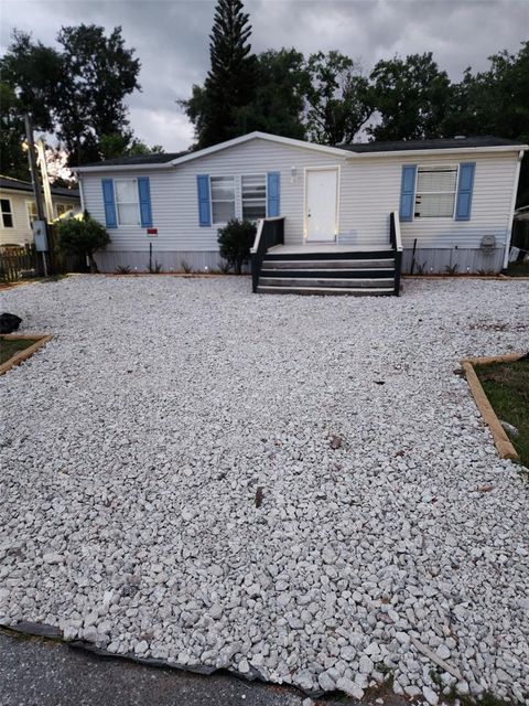 Photo of 9514 11th Avenue, Orlando, FL 32824 (MLS # O6403464)