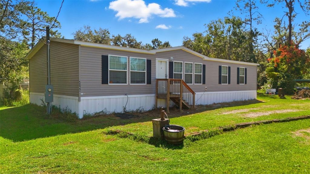 Photo of 5022 Carol Drive, Wesley Chapel, FL 33543 (MLS # TB8441218)