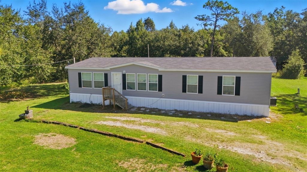 Photo of 5022 Carol Drive, Wesley Chapel, FL 33543 (MLS # TB8441218)