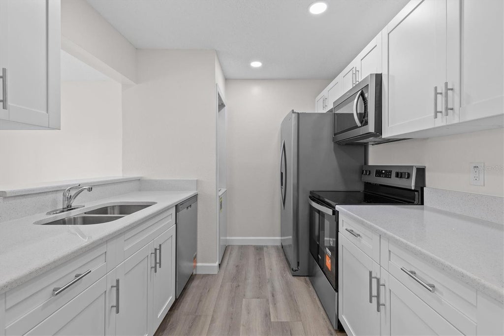 Photo of 381 Moorings Cove Drive #9B, Tarpon Springs, FL 34689 (MLS # TB8554593)