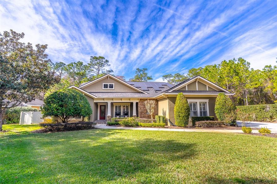 Do not miss this opportunity to tour a home rarely available in this community, where elegance and privacy define every space. Tucked within gated Country Lake Estates, this residence offers a secluded retreat with private lake access in one of East Orlando’s most desirable settings.

The main living level is thoughtfully designed to accommodate both everyday living and multi generational needs. Formal and casual spaces flow comfortably together, anchored by a chef’s kitchen that opens to a light filled family room overlooking the pool and outdoor living areas. The primary suite is located on the main floor, offering privacy and ease of living, while a separate generational living suite features its own kitchenette and private entry, ideal for extended family, guests, or long term flexibility.

Outdoor living remains a focal point of the home. Covered and open patio spaces surround the pool, complemented by an outdoor kitchen suited for entertaining or quiet evenings at home. A private, tree lined walk winds through mature cypress, leading to the dock and boat lift and offering peaceful, direct access to the lake without sacrificing the home’s sense of seclusion.

Upstairs, the home continues to impress with an oversized loft and a private en suite bedroom featuring a walk in closet and its own kitchenette. This level functions beautifully as a guest retreat, secondary primary style suite, or flexible living space that feels intentionally separate from the main floor.

Behind the scenes, the property reflects a high level of care and investment, including an owned solar system, whole home generator, newer roof, and a dedicated RV power connection, delivering long term efficiency and peace of mind.

Ideally positioned in East Orlando, the home offers convenient access to Lake Pickett, nearby equestrian areas, top rated schools, major roadways, and everyday amenities, all while maintaining the quiet privacy that defines this exceptional property. This is a rare opportunity to secure a refined home with true flexibility, private lake access, and a gated setting.