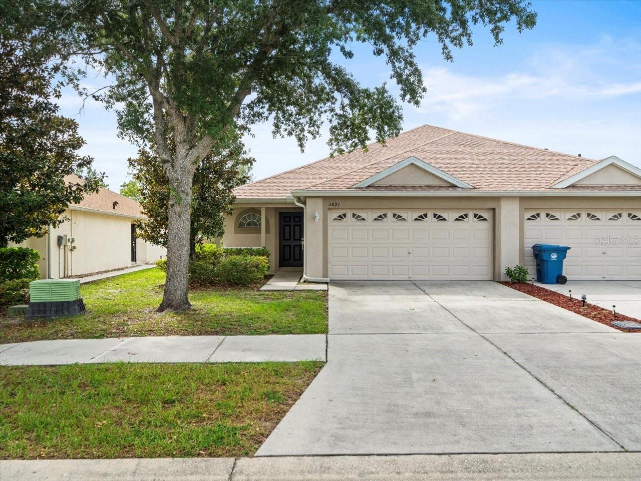 2008 Tripp Trademark Villa with 3 bedrooms, 2 full bathrooms and a 2 car garage. New Roof 2025 on this Spacious Savannah floor plan, Maple cabinetry in kitchen & baths, Granite counters in kitchen, new SS appliances including refrigerator, built in microwave, stainless steel sink, ceramic tile in all wet areas, large pantry, large master shower with seat, lots of closet space, rounded corners in traffic areas, covered lanai, Sunburst garage windows and irrigation system.1,607 Living sqft, 2,162 Total sqft. Centrally located in Sterling Hill with resort style amenities including, 2 pools, 2 playgrounds, tennis, exercise facility, splash pad, dog run and more.