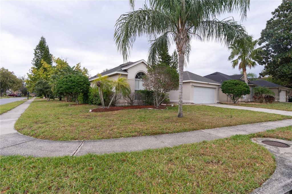 Photo of 12860 Waterhaven Circle, Orlando, FL 32828 (MLS # O6403850)