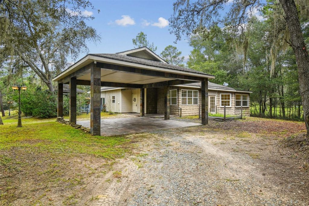 Photo of 16453 Pawnee Drive, Brooksville, FL 34601 (MLS # TB8454533)