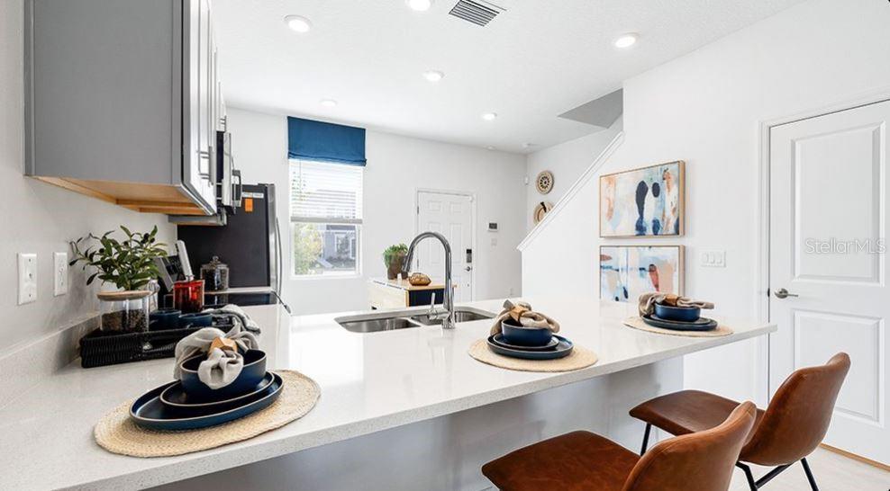 TOWNHOMES AT AZARIO - Residential