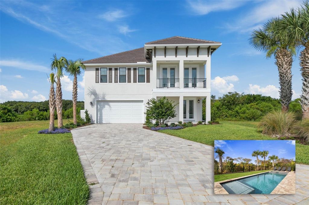 Photo of 7 Cinnamon Beach Way, Palm Coast, FL 32137 (MLS # FC315063)