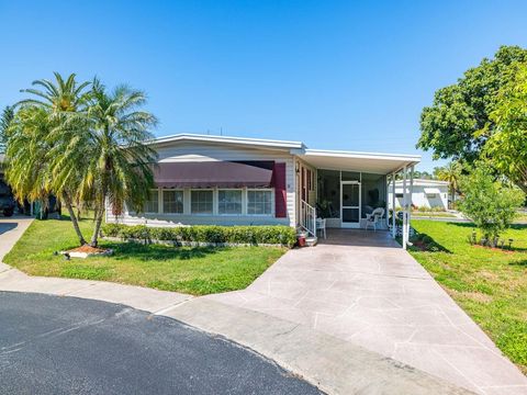 Photo of 32 Palm Forest Drive, Largo, FL 33770 (MLS # TB8364882)