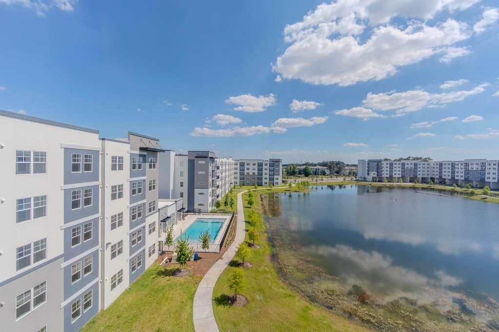 Photo of 5579 Millenia Park Blvd #511, Orlando, FL 32839 (MLS # O6409236)