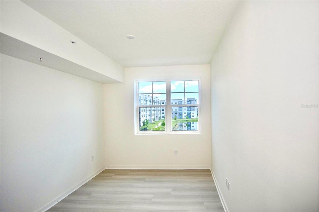 Photo of 5579 Millenia Park Blvd #511, Orlando, FL 32839 (MLS # O6409236)