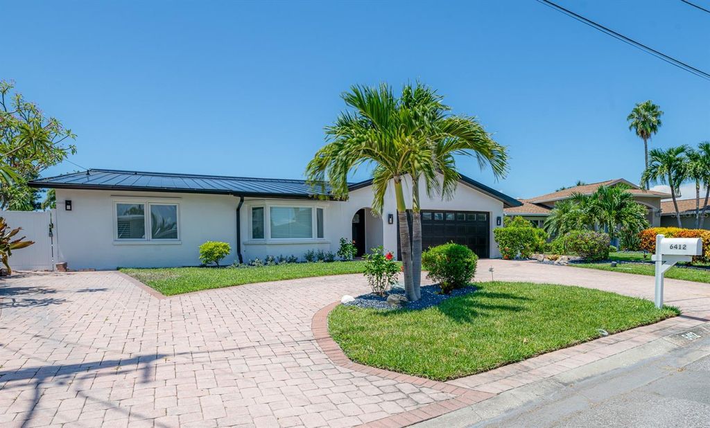 Photo of 6412 1st Palm Point, St Pete Beach, FL 33706 (MLS # TB8419583)