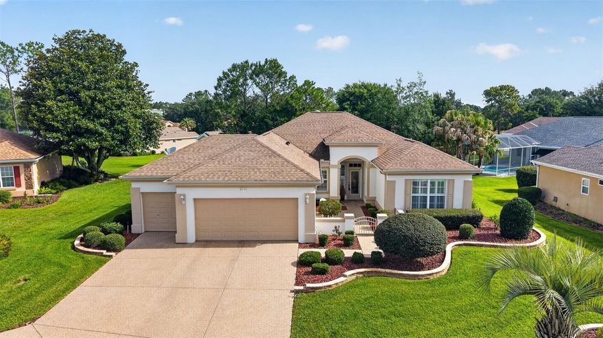 DON'T MISS this well-maintained 2-bedroom, 2-bath Madeira floor plan with a golf cart garage, situated on a Huge semi-private lot with relaxing views in the highly sought-after 55+ premier golf community of Del Webb Spruce Creek Golf & Country Club.
This beautiful home offers exceptional curb appeal with stacked-stone landscape walls and a welcoming courtyard entry leading to an elegant leaded-glass front door. Inside, you’ll find crown molding, plantation shutters, and tile flooring throughout the home "NO CARPET".
The updated kitchen features Maple cabinets, Corian countertops, stainless-steel appliances, recessed lighting, pendant lighting over the breakfast bar, and a comfortable breakfast nook for casual dining.
The spacious primary suite includes crown molding, a large walk-in closet, and a bow window for added space and natural light. The ensuite bath offers dual sinks and a walk-in shower. The guest bedroom and bath are equally impressive, featuring crown molding.
Additional highlights include an extended garage with extra storage space, a golf cart garage, a brand-new 2025 HVAC system, a gas water heater, and a roof re-shingled in 2014. Save money with a shared irrigation well.
Enjoy the enclosed climate-controlled Florida room, offering comfortable year-round enjoyment and additional living space not included in the stated square footage. Designed for entertaining, the open floor plan flows seamlessly into this inviting space, perfect for relaxing and enjoying Florida living while taking in the peaceful semi-private views.
