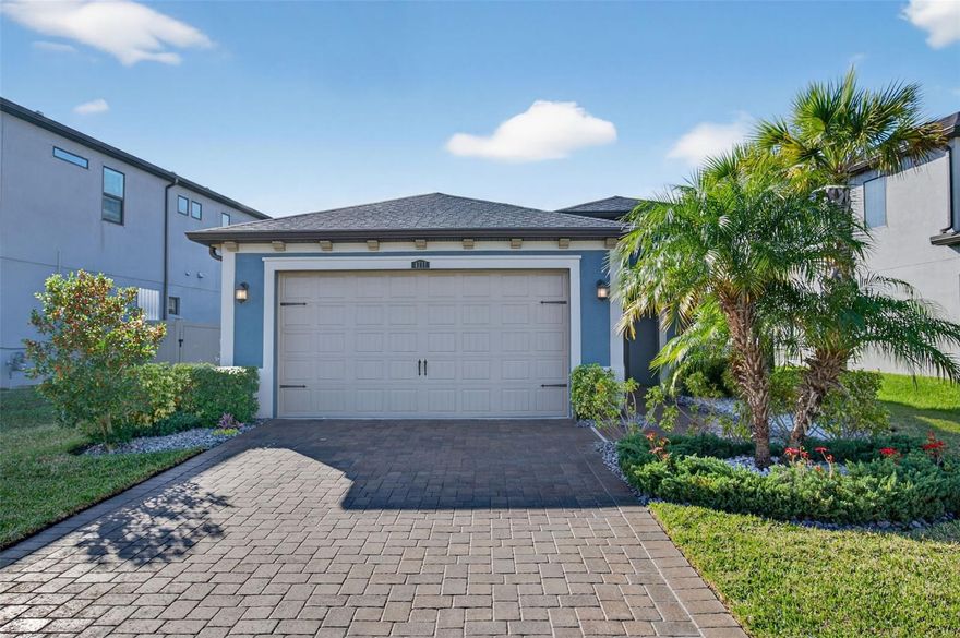 It’s a new year—make it the year you find your next home! Welcome to 4711 San Martino Drive, located in the highly sought-after community of Estancia at Wiregrass Ranch in Wesley Chapel.
This stunning Sterling floor plan, built in 2021 by WCI/Lennar, showcases exceptional pride of ownership from the moment you arrive. The Mediterranean-style elevation is complemented by upgraded exterior landscaping, lush St. Augustine sod, and an inviting luxury paver driveway.
Step inside this move-in-ready 3-bedroom, 2-bath, 2-car garage home and enjoy wall-to-wall wood-look plank tile that flows seamlessly throughout—offering both elegance and low-maintenance living. With zero wasted space, this thoughtfully designed floor plan has been impeccably maintained.
The heart of the home features timeless white cabinetry with under-cabinet lighting, stunning Calacatta Gold quartz countertops, and a classic porcelain farmhouse sink. The kitchen opens beautifully to a spacious formal dining area and flows effortlessly into the large living room, highlighted by a gorgeous tray ceiling and upgraded lighting.
The primary suite offers a true retreat with ample space to unwind. The en-suite bathroom includes dual vanities, a large walk-in shower, and a generously sized walk-in closet.
Enjoy Florida living year-round on the customized lanai, featuring matching wood-look flooring and full screening. The backyard is a gardener’s paradise with upgraded landscaping and is fully fenced, providing both privacy and tranquility.
Living in Estancia at Wiregrass Ranch means being part of a vibrant resort-style community with world-class amenities including lushly landscaped parks, scenic walking trails, and a resort-style clubhouse and pool—perfect for relaxation and recreation. Conveniently located near The Shops at Wiregrass, AdventHealth Wesley Chapel, I-75, and top-rated schools, this location offers an unmatched combination of elegance and accessibility. Don’t miss this rare opportunity to own a turnkey home in one of Wesley Chapel’s most desirable gated communities. With its modern design, post closing upgrades, high-end finishes, incredible amenities, and LOW HOA this home is truly a gem. Schedule your private showing today and experience the lifestyle you deserve! **Buyer may be eligible to receive closing cost credit through preferred lender.*