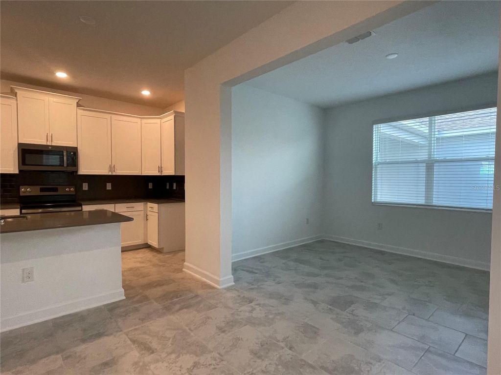 Photo of 9777 Petition Way, Orlando, FL 32832 (MLS # O6426195)