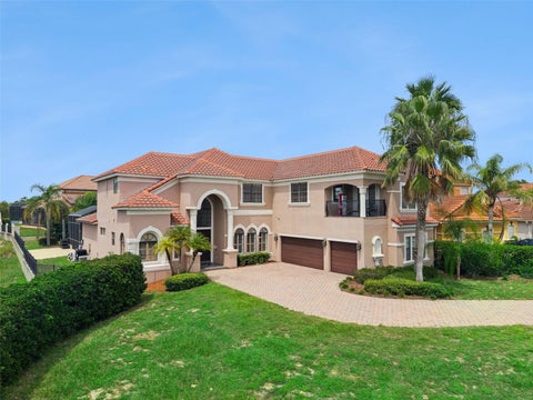Photo of 135 Woodmoor Ct, Davenport, FL 33837 (MLS # S5156854)