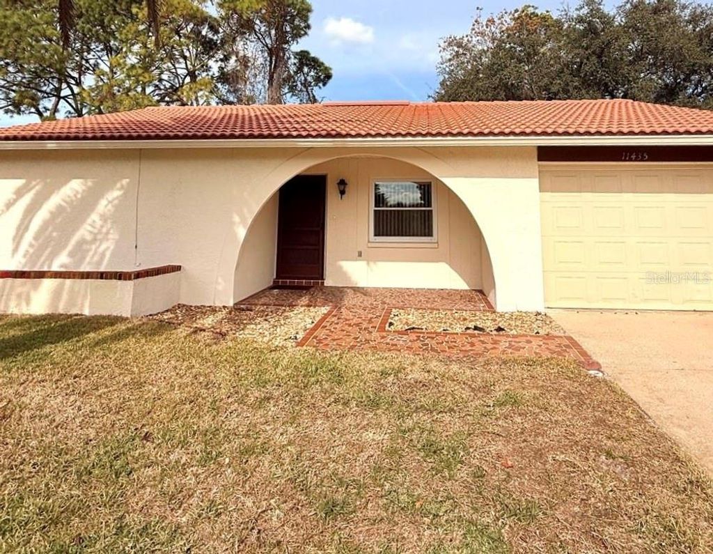 Photo of 11435 Stansberry Drive, Port Richey, FL 34668 (MLS # W7881332)