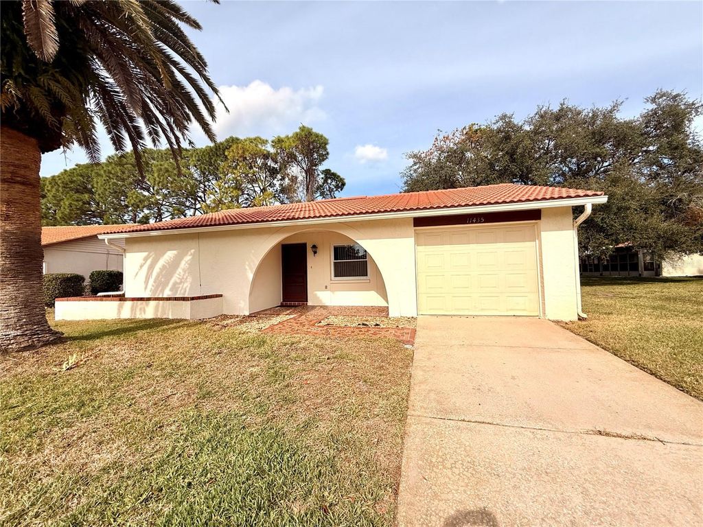 Photo of 11435 Stansberry Drive, Port Richey, FL 34668 (MLS # W7881332)