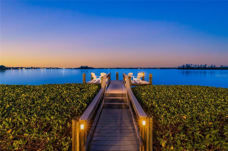 Private Island, Gated Home, Private access to deeded beach!

Experience the epitome of exclusivity with unheard of waterfront views, unmatched privacy, and breathtaking, expansive vistas from your own private island retreat. Tucked away on a private island in Siesta Key’s South Cocoanut Bayou, this Tuscan-inspired estate feels like it’s been plucked from the pages of a storybook.  The estate at 4315 Mangrove Place features a Tuscan-inspired central courtyard with over 4000 sq ft designed as the heart of the home. It is a grand, open-air courtyard enclosed by both the main residence and the guest villa, connected via an elegant, covered breezeway.
The main residence offers soaring ceilings, intricate millwork, and expansive living spaces ideal for entertaining or quiet coastal living. A gourmet chef’s kitchen, formal dining room, library, owner ensuite located on the main level with his & hers walking closets and bathrooms, and custom home theater create a balanced blend of function and indulgence, Elevator in main residence & private elevator in guest house.
Connected by a covered breezeway, the guest villa features its own living quarters, private elevator, one bedroom, full bathroom, living room and full kitchen—perfect for multigenerational living or extended guests. 
With six bedrooms, nine baths, a three-car garage, and an ambiance that feels like a timeless escape, this estate is more than a home—it's a legacy, a retreat, a living Castle fairytale.
Outdoors, a resort-style pool and spa, and lush tropical landscaping create a serene oasis, while a private deep-water dock provides direct access to the Intracoastal and Gulf with no fixed bridges. Eligible to membership to private beach.
