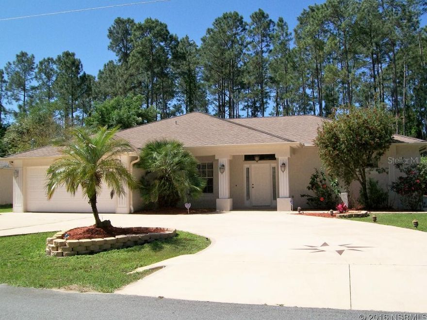 STOP LOOKING! Deal of the century... better than NEW with many upgrades. Beautiful 3 bedroom 2 bath home features California Closets in the master bedroom and also in the kitchen pantry. Large open kitchen that overlooks the den w/fireplace and eat-in-kitchen. Formal living room and dining room. Large front entry lanai, backyard screened in lanai and a large open patio great for grilling. This home comes with a generator for power backup, hurricane shutters for all doors and windows. Whole home water softener and an extra bonus kitchen faucet water purification system. Recessed lights in the master bedroom and also in the kitchen for an added bonus. This home is immaculate inside and out and detailed service records for the A/C, water heater,water softener, irrigation system, appliances, duct cleaning, termite bonded and more. Enjoy your over sized two car garage with storage cabinets and flooring for over the garage attic for extra storage. Home comes with gutters with french drains, over twenty thousand dollars in killer landscaping. Six zoned irrigation sprinkler system with private well. Circular drive with 4-foot sidewalks all around the perimeter of the home. 8 x10 Shed with electric. Home comes cable ready, and a whole home security system. Only two minutes away from Town Center and ten minutes from Flagler Beach. Price right and won't last long. All information is intended to be accurate but not guaranteed. ;Water: City