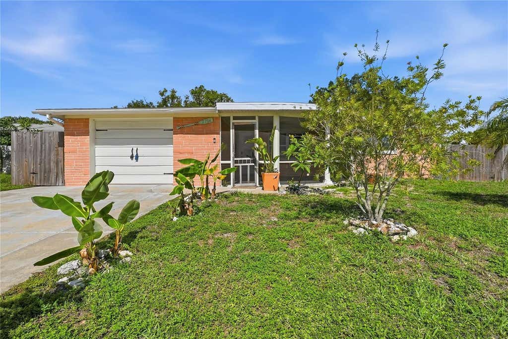Photo of 2704 Lawn Place, Holiday, FL 34691 (MLS # TB8513759)