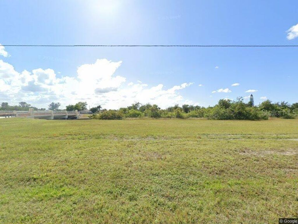 Photo of 1408 NE 23rd Terrace, Cape Coral, FL 33909 (MLS # O6304648)