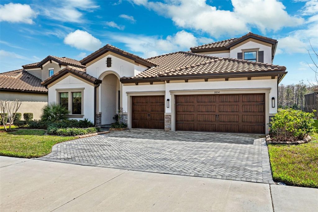 Photo of 11650 Ranchers Gap Drive, Odessa, FL 33556 (MLS # TB8348476)