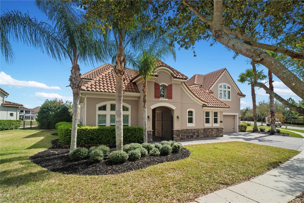 Photo of 7560 Blue Quail Lane, Orlando, FL 32835 (MLS # O6388407)