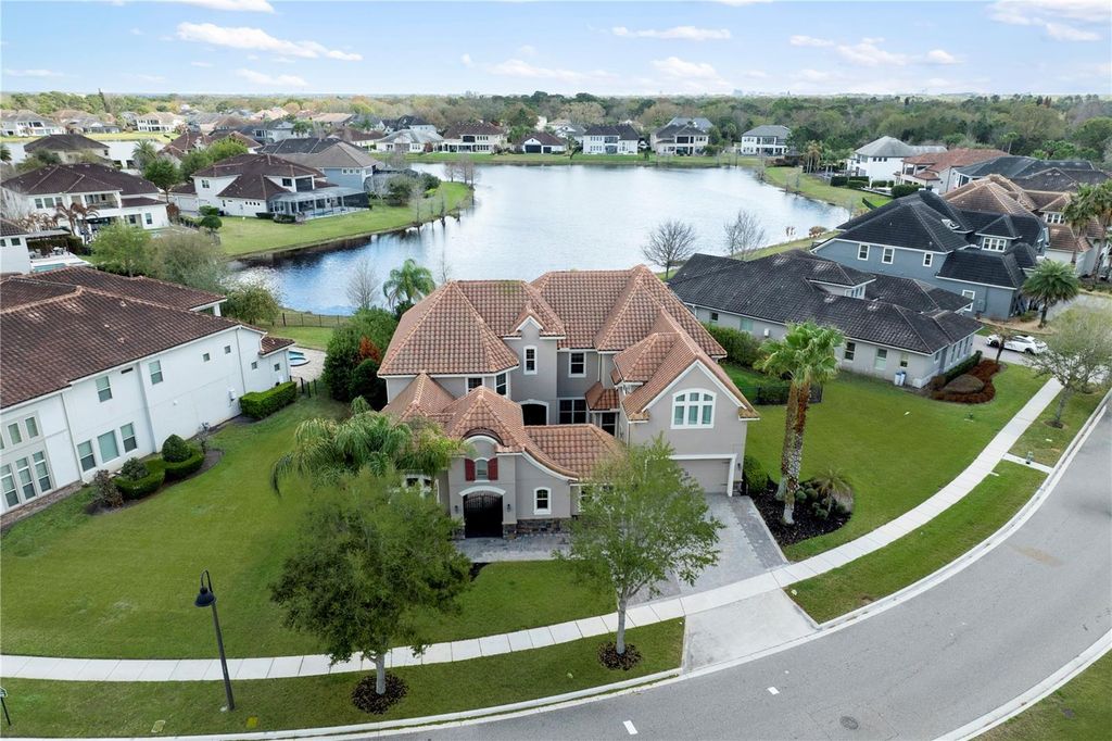 Photo of 7560 Blue Quail Lane, Orlando, FL 32835 (MLS # O6388407)