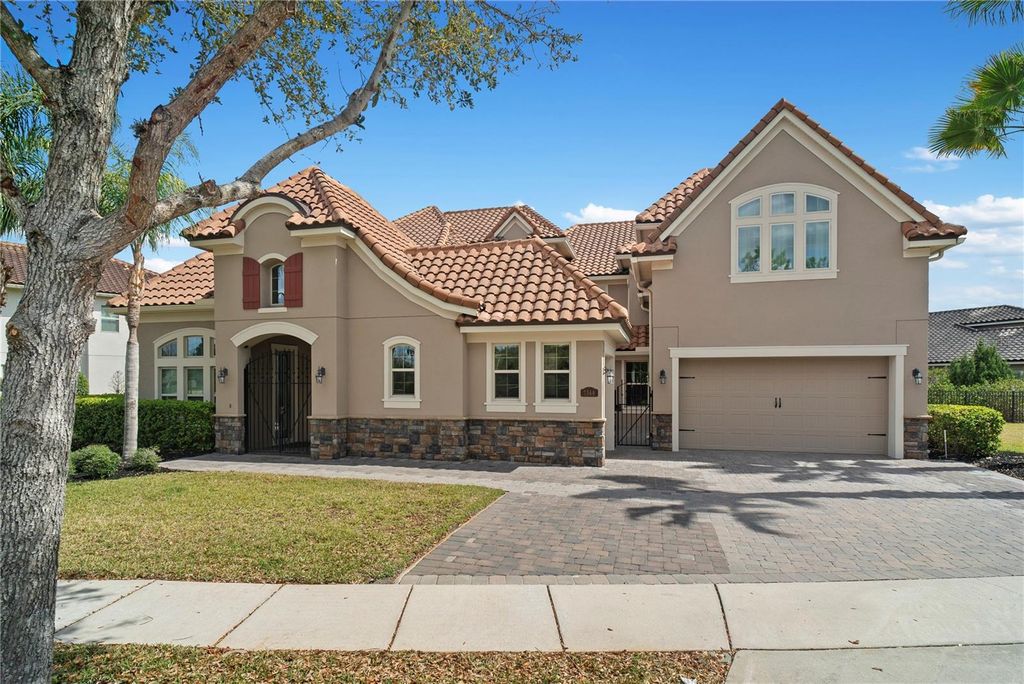 Photo of 7560 Blue Quail Lane, Orlando, FL 32835 (MLS # O6388407)