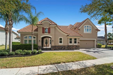 Photo of 7560 Blue Quail Lane, Orlando, FL 32835 (MLS # O6388407)