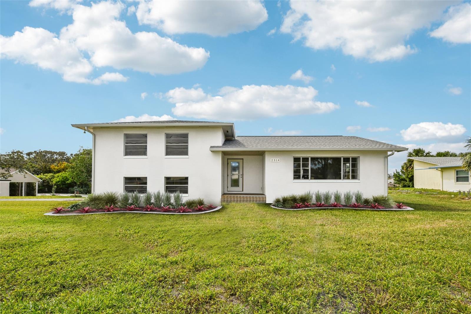 * Professional photos coming soon* Welcome to your future dream beachside retreat! This spacious five-bedroom, three-bathroom home offers the perfect blend of coastal living and serene river views with easy access to launch a kayak or enjoy some fishing steps away from your door. This home is a blank canvas that needs finishing touches, allowing you to personalize it and transform it into the ultimate getaway. Whether you're looking for a family home, a vacation retreat, or a property with generational living potential, this is an incredible opportunity to create your perfect beachside sanctuary. As you enter, you'll appreciate the abundance of natural light streaming through the windows. The well-appointed kitchen is perfect for gathering with family and friends,Each of the five bedrooms provides generous space, allowing for comfort and privacy, while the three bathrooms ensure convenience for all.This home also presents fantastic generational living potential, with flexible spaces that can accommodate extended family or guests, offering independence and comfort for everyone. Step outside to discover the incredible outdoor space. With nearly a half acre at your disposal, you can easily envision a private pool, lush gardens, or recreational areas for various outdoor activities. Plus, enjoy easy access to the river, perfect for kayaking, fishing, or simply enjoying a peaceful day by the water.